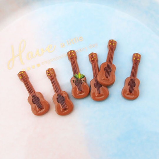 Cây Đàn Guitar 1,2 x3,5cm